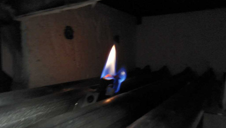 Standing pilot flame on a gas fireplace
